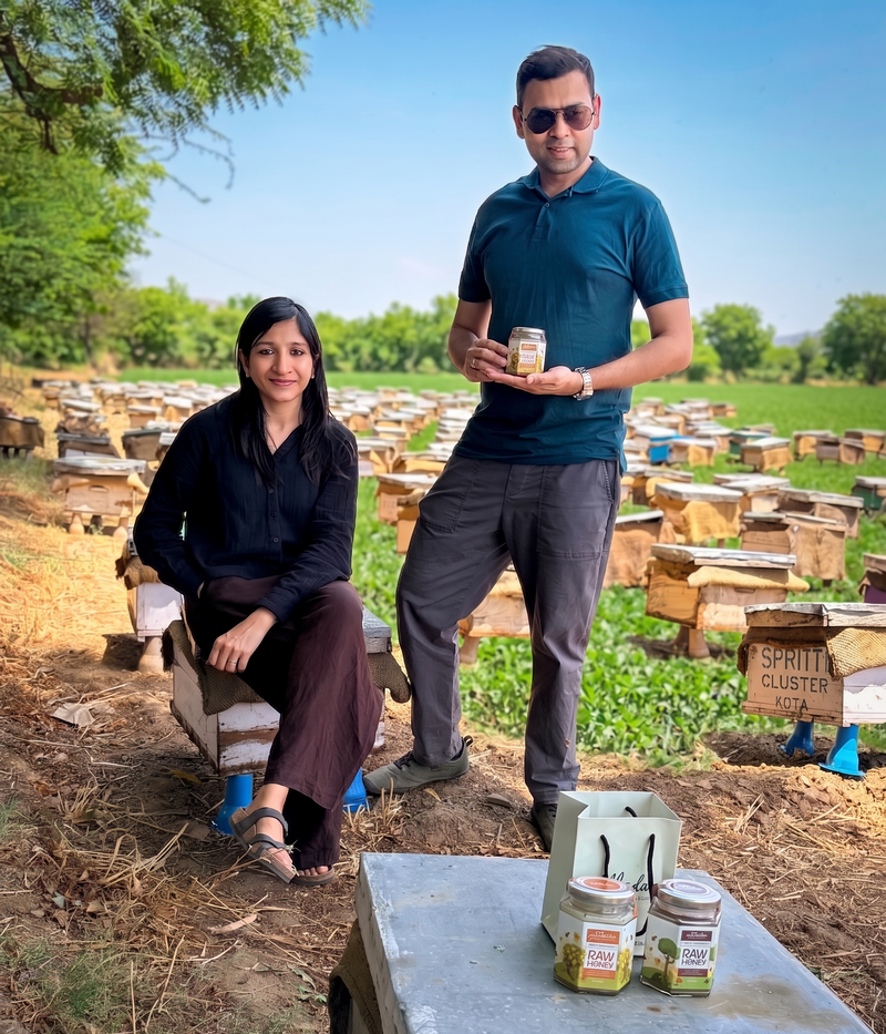 Traditional beekeeper harvesting honey